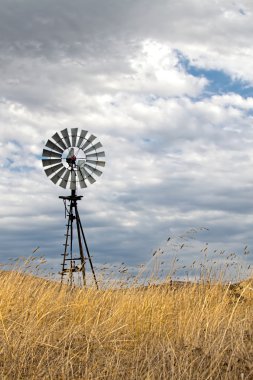 Vintage Wind Mill in Central California clipart