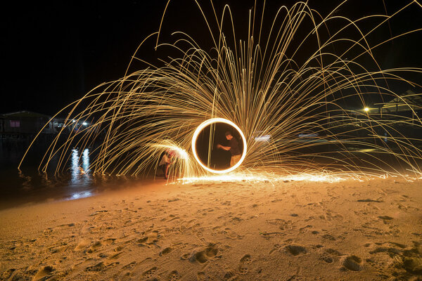 Boy dive in clear sea and beautiful white sand beach in Borneo island Malaysia 