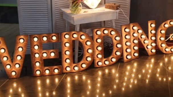 Wedding decoration. Wooden board with sign Wedding — Stock Video
