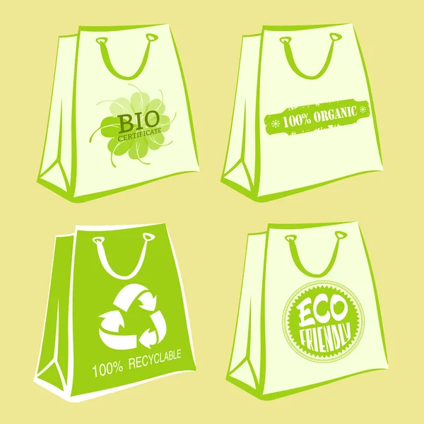 Set of white paper bags with ecological signs and green contours. Bio certificate, 100% organic, eco friendly, recyclable labels. Vector illustration 