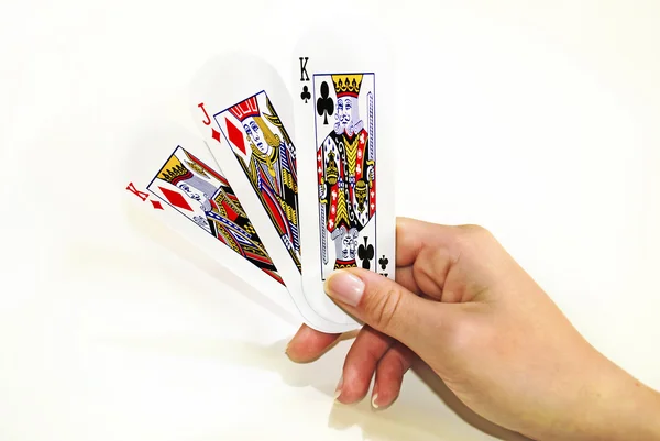 Mão segurando cartas de jogo — Fotografia de Stock