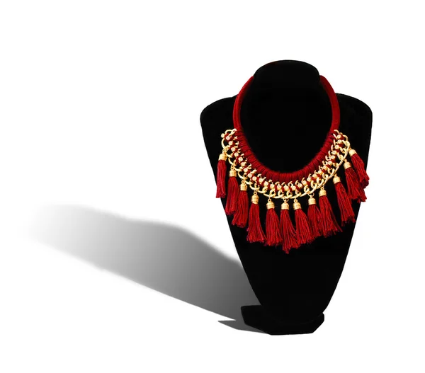 Красный ожерелье с тенью — стоковое фото