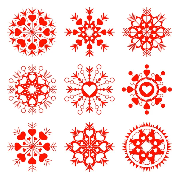 Copo de nieve, conjunto de iconos de la vista del corazón. Navidad, San Valentín, símbolo de cumpleaños. Estrellas, copos con corazones. Siluetas rojas sobre fondo blanco. Vector aislado — Vector de stock