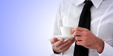 İş adamı kahve molası veriyor.