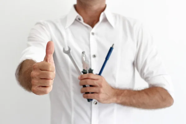 Gelukkig reparateur werken in het huis — Stockfoto