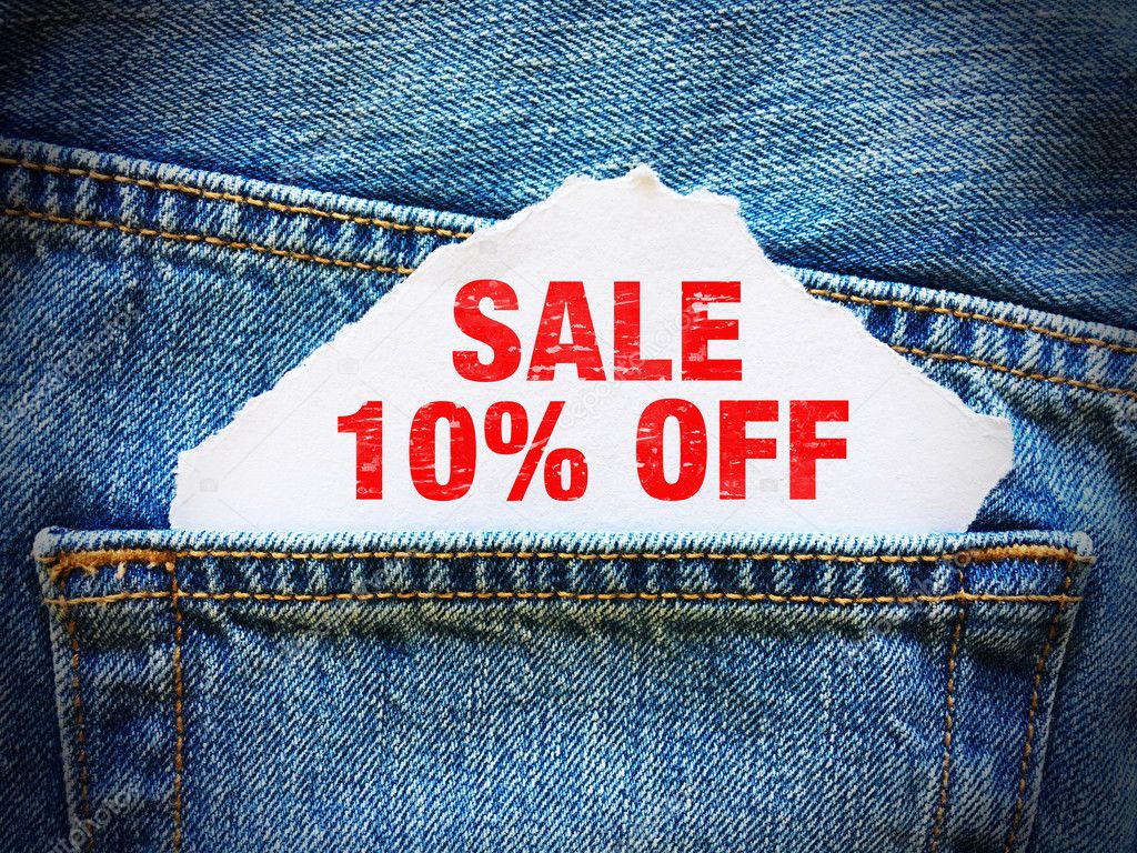 10% off on white paper in the pocket of blue denim jeans