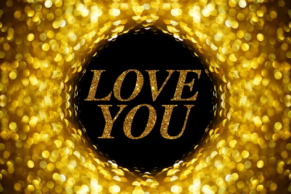 Gold bokeh abstrakt bakgrund med ordet Love you — Stockfoto