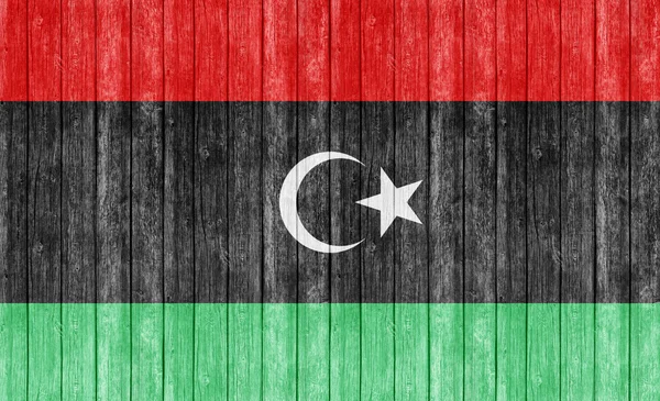 Eski ahşap dokusunda Libya bayrağı