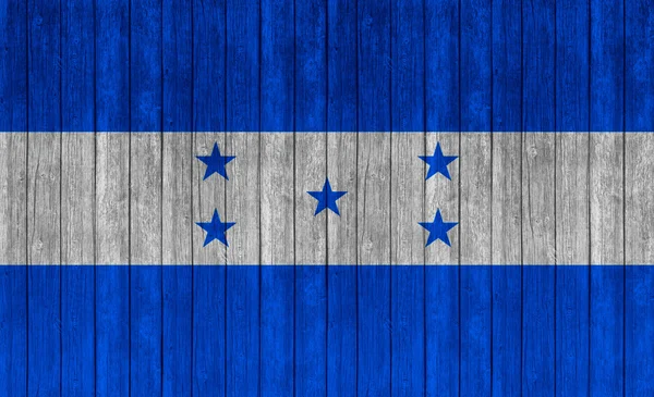 旧木纹背衬上的洪都拉斯国旗 — 图库照片