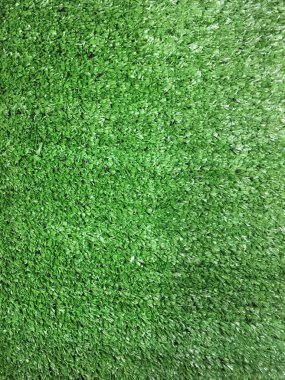 yeşil yapay çim arka planı. Üst görünüm, kapat
