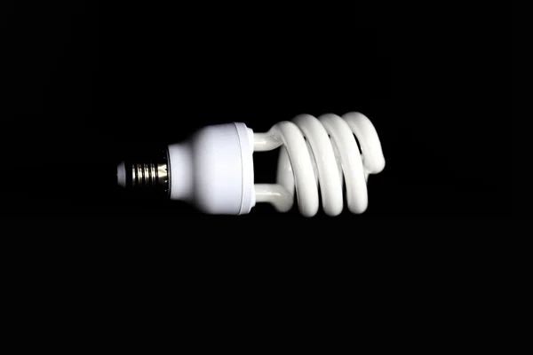 Energy Saving Fluorescent Light Bulb Black Background — Stock Photo, Image