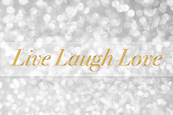 Live Laugh Love quote typography on white glitter bokeh abstract background