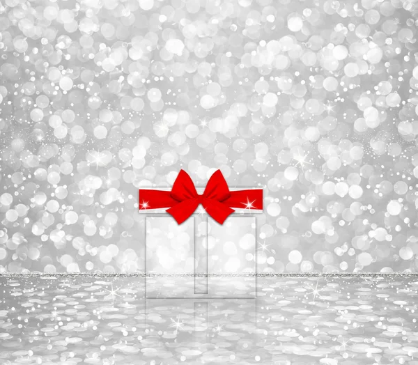 ギフトボックス赤い弓白い銀の輝きボケ抽象的な背景 — ストック写真