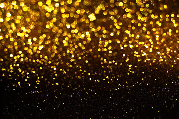 black and gold glitter bokeh texture abstract background