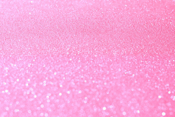 розовые блестки bokeh текстуры Рождества абстрактный фон
