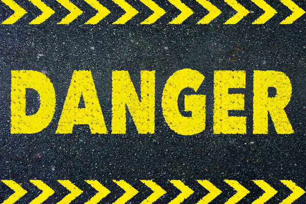 Danger sign on road