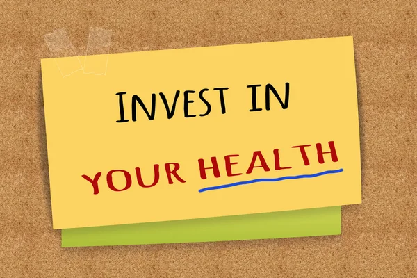Invest in your health on sticky note — Stock Image Invest Your Health Sticky Note Royalty Free Stock Photos