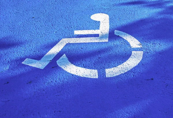 Wheel chair sign parking spot Royalty Free Stock Images