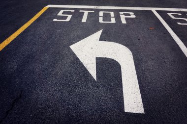 Stop before turn left arrow on street clipart