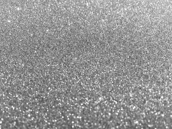 Блёстки белого серебра боке текстура Рождества абстрактный фон
