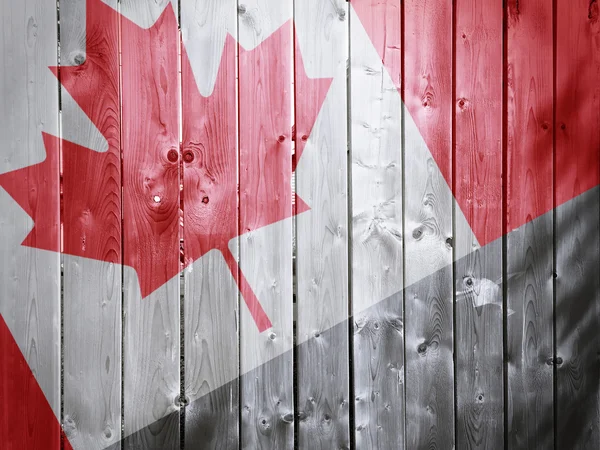 Kanadská vlajka na dřevo textury pozadí — Stock fotografie
