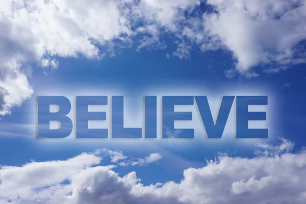 Believe word on blue sky — Stock Photo, Image