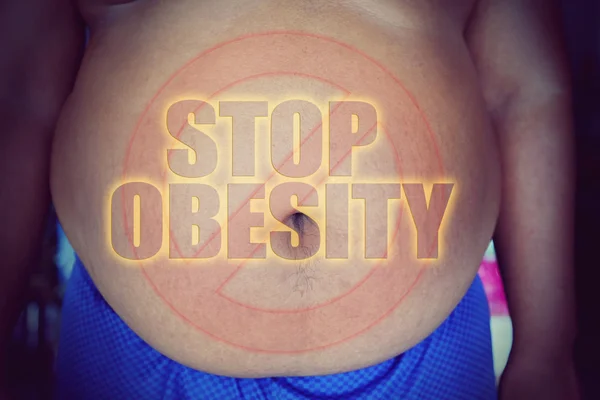 Dicker Mann mit dickem Bauch, mit Worten gegen Fettleibigkeit — Stockfoto