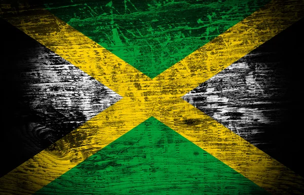 Bandera de Jamaica sobre textura de madera fondo — Foto de Stock