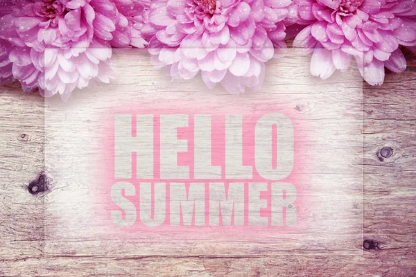 Pink flowers on wooden with word Hello Summer — Stock Photo, Image