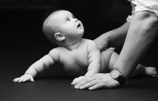Beautiful baby on a black background — Stock Photo, Image