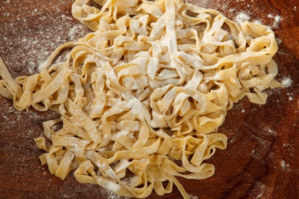 Fresh pasta on board — Stock Photo, Image