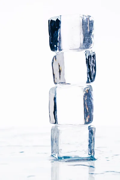 Ice cubes on table — Stock Photo, Image