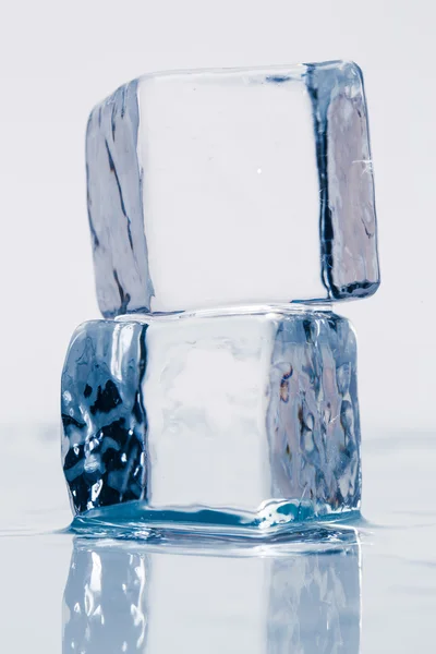 Ice cube on table — Stock Photo, Image