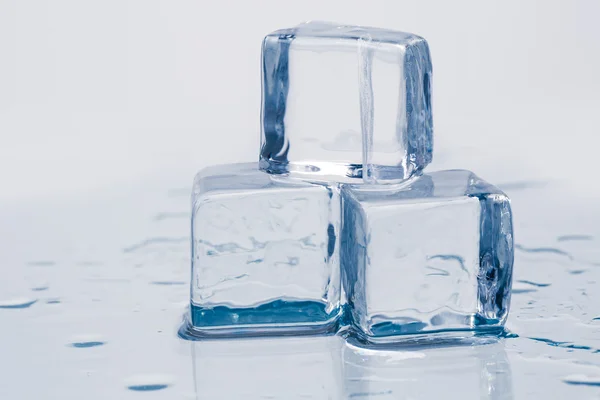 Ice cubes on table