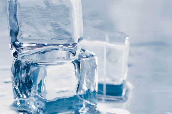 Ice cubes on table — Stock Photo, Image