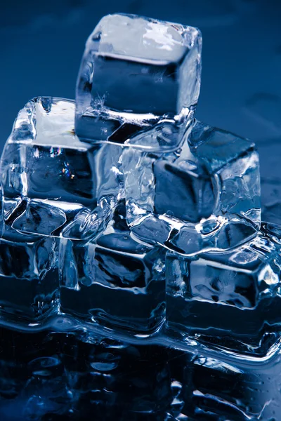 Ice cubes on table — Stock Photo, Image