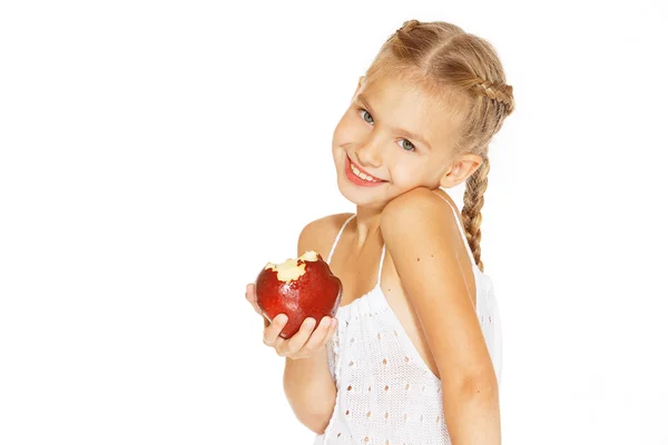 Charming girl with an apple — Stock Photo, Image