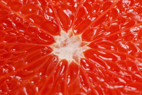 Кусочек красного грейпфрута — стоковое фото