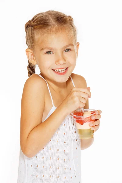 Little girl eating jello — Stock Photo, Image