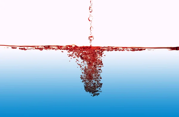 Salpicar agua roja — Foto de Stock