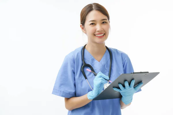 Close Asian Female Nurse Holding Clipboard Pen Smile Camera Meet — 图库照片