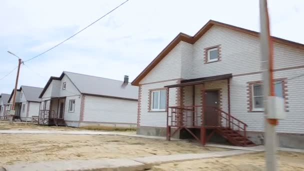 Street of identical brick houses — Stock Video