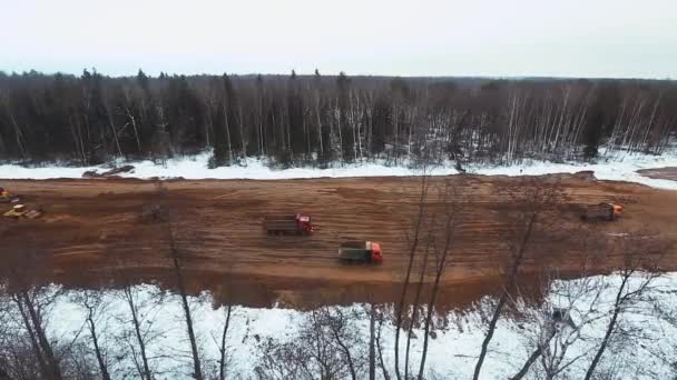 Maquinaria de construcción en construcción de carreteras fotografía aérea — Vídeos de Stock