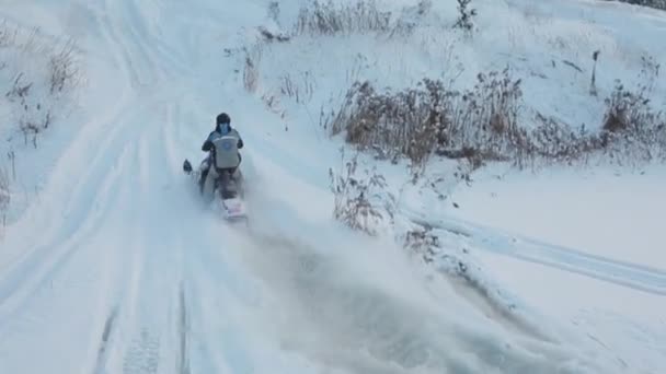 Snowmobile trips on ice and snow — Stock Video