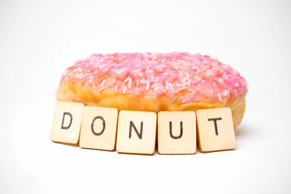 Een Ijsring Donut Een Witte Achtergrond Met Een Gebarentaal Donut — Stockfoto