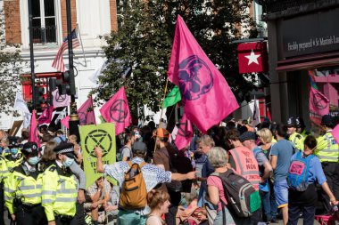 London, United Kingdom, 21st August 2021:- Members of Extinction Rebellion take part in a protest in central London clipart