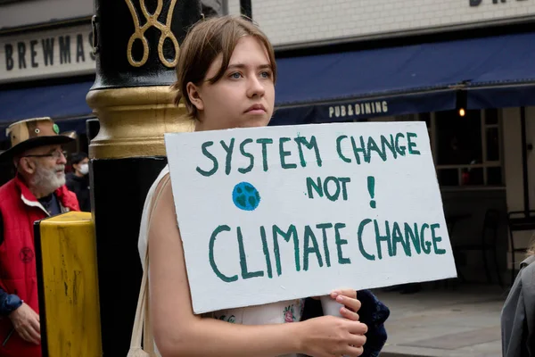 2021 Extinction Rebellion Protester Holding Sign Reading System Change Climate — 스톡 사진