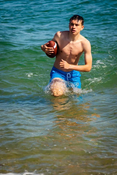 Year Old Caucasian Shirtless Teenage Boy Swimwear Playing American Football — Stock Photo, Image