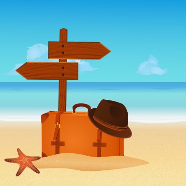 Travel accessories on tropical beach