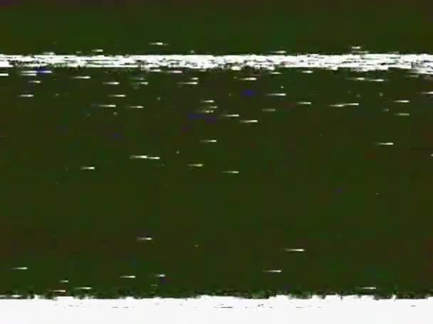 VHS echte defecten lawaai en artefacten, glitches van een oude tape, zwart scherm — Stockvideo